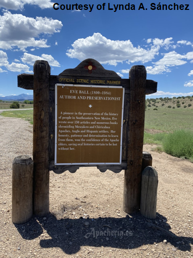 Historic marker for Eve Ball with the Sacred Mountains in the background. 