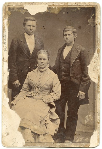 Sallie Chisum Robert (seated) with brothers. 
