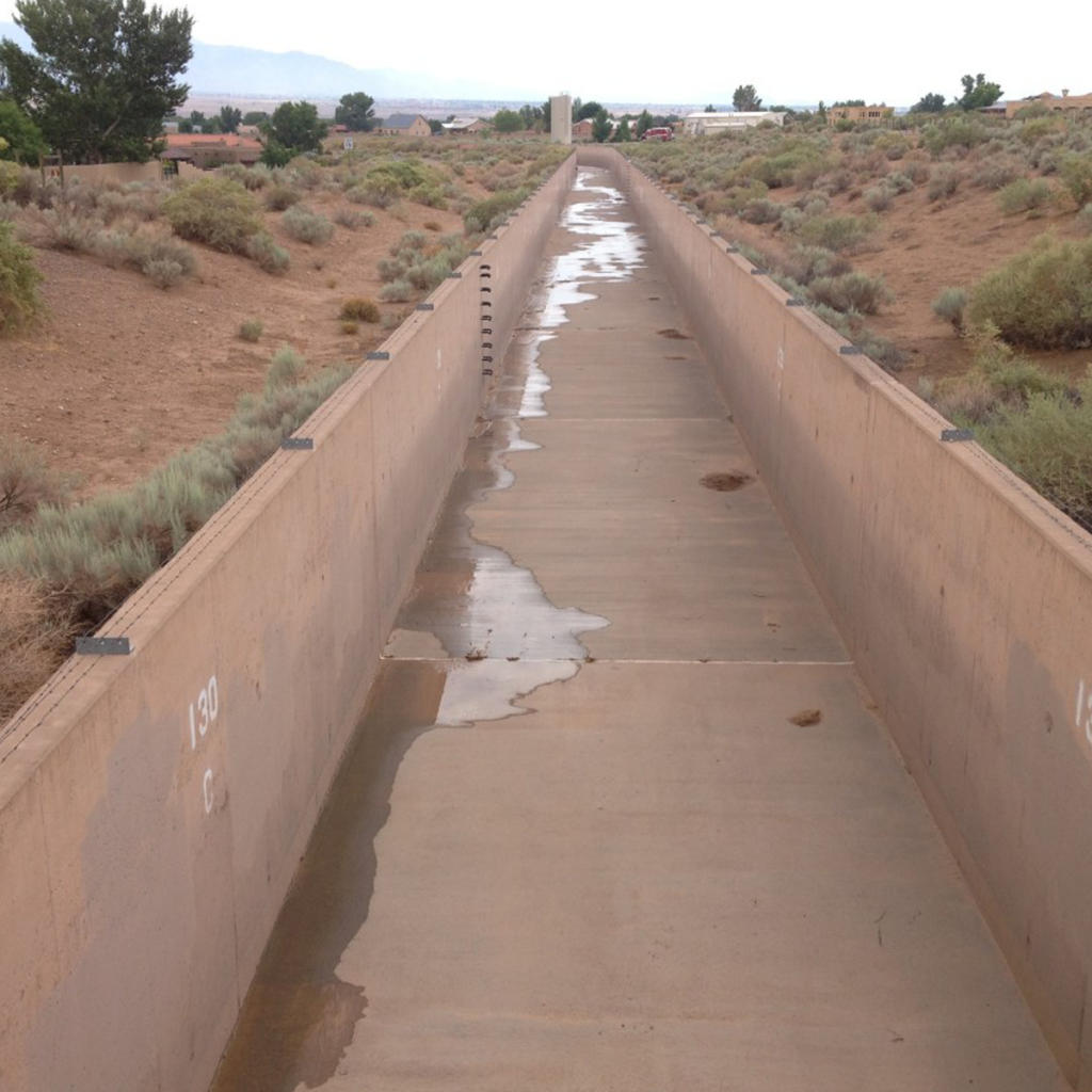 Flood-control channel named in honor of Dulcelina Curtis.