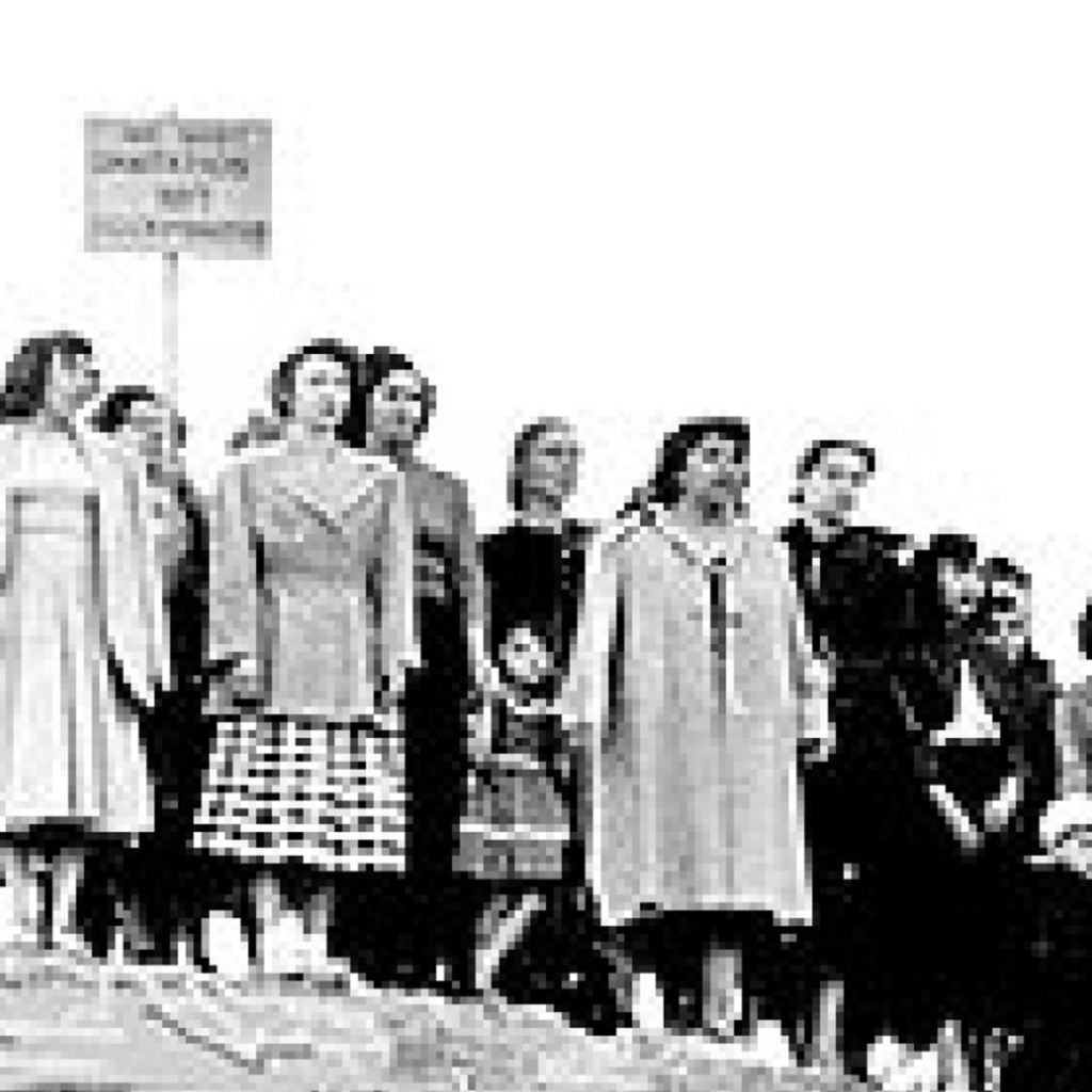 Scene from "Salt of the Earth": Ladies Auxiliary of Local 890 standing on the picket line.